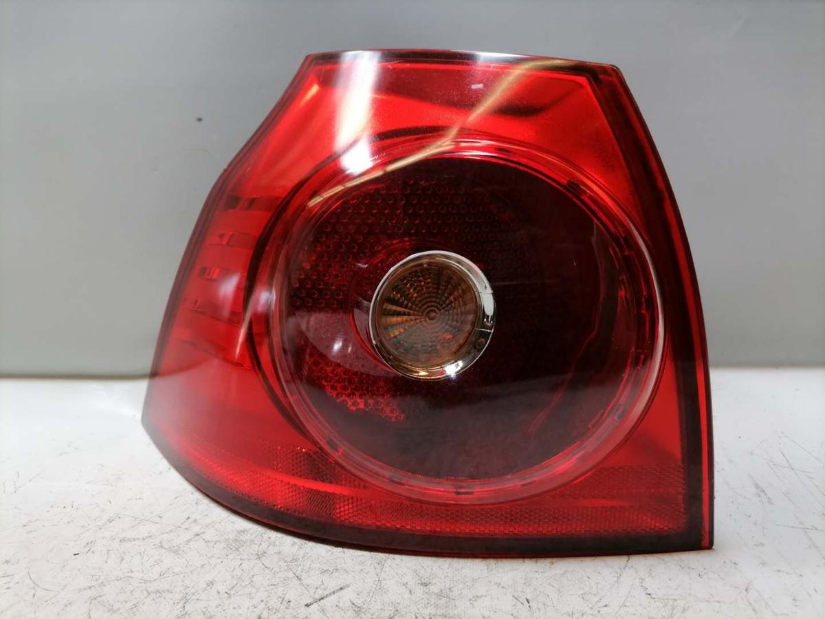 VW Golf 5 original R&uuml;cklicht R&uuml;ckleuchte Heckleuchte au&szlig;en links Flie&szlig;heck BJ04